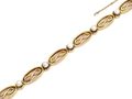 French 18kt yellow gold infinity bracelet set with pearls