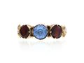 Antique blue paste and garnet foil back three stone ring