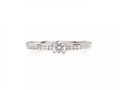 Flanked solitaire diamond engagement ring in 18kt white gold