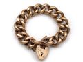Antique 9kt rose gold textured curb bracelet with heart lock