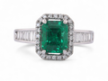 Emerald and diamond cluster ring
