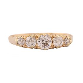 A five stone diamond ring in 18kt yellow gold