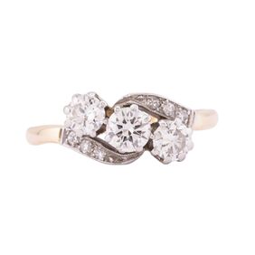 THREE STONE CROSS OVER RING