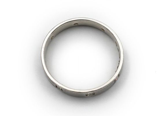 Platinum diamond set ring with incised borders