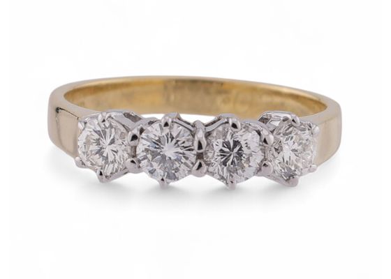 Vintage four stone diamond ring in 18kt yellow gold