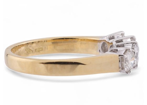 Vintage four stone diamond ring in 18kt yellow gold