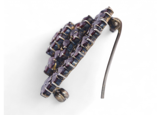 Antique silver gilt brooch set with rose-cut garnets in a domed circular cluster