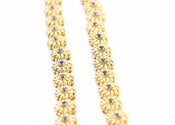 Vintage emerald ring with round cut emerald on reeded 18kt yellow gold band