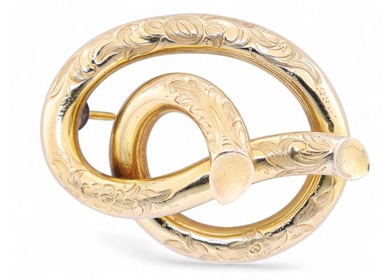 Antique Knotted Stem Brooch in Foliate Engraved 18kt Yellow Gold