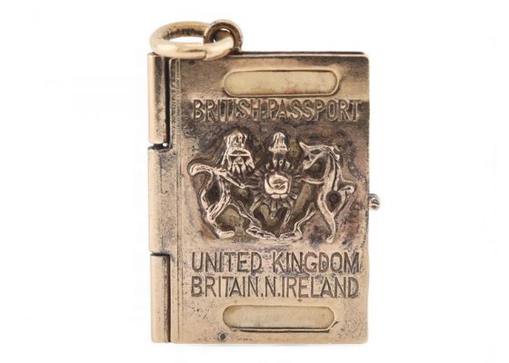 1960s passport charm in 9ct gold
