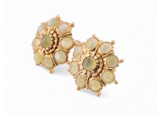 Vintage 9k gold earrings set with round chrysoberyl cabochons
