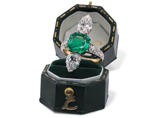 Emerald and diamond engagement ring
