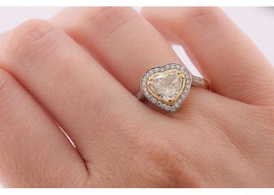 Modernist, heart shape fancy light yellow diamond cluster ring
