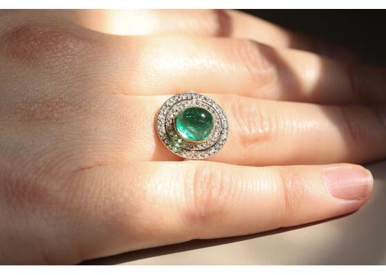 Edwardian Cabochon Emerald ring with tiered double diamond millgrain border