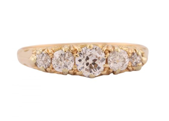 A five stone diamond ring in 18kt yellow gold