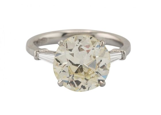 A platinum solitaire ring set with an old European cut