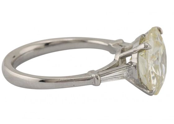 A platinum solitaire ring set with an old European cut