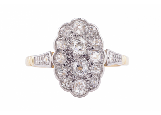 EDWARDIAN DIAMOND CLUSTER DAISY RING, CIRCA 1910